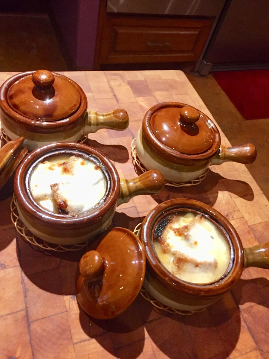 Bowl of Simple Onion Soup with Melted Mozzarella Cheese