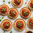 descubre cómo preparar unas deliciosas tostadas de hummus con tomate confitado. una receta fácil, saludable y perfecta para compartir en cualquier ocasión.