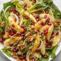 Ensalada de escarola e hinojo con manzana en fuente